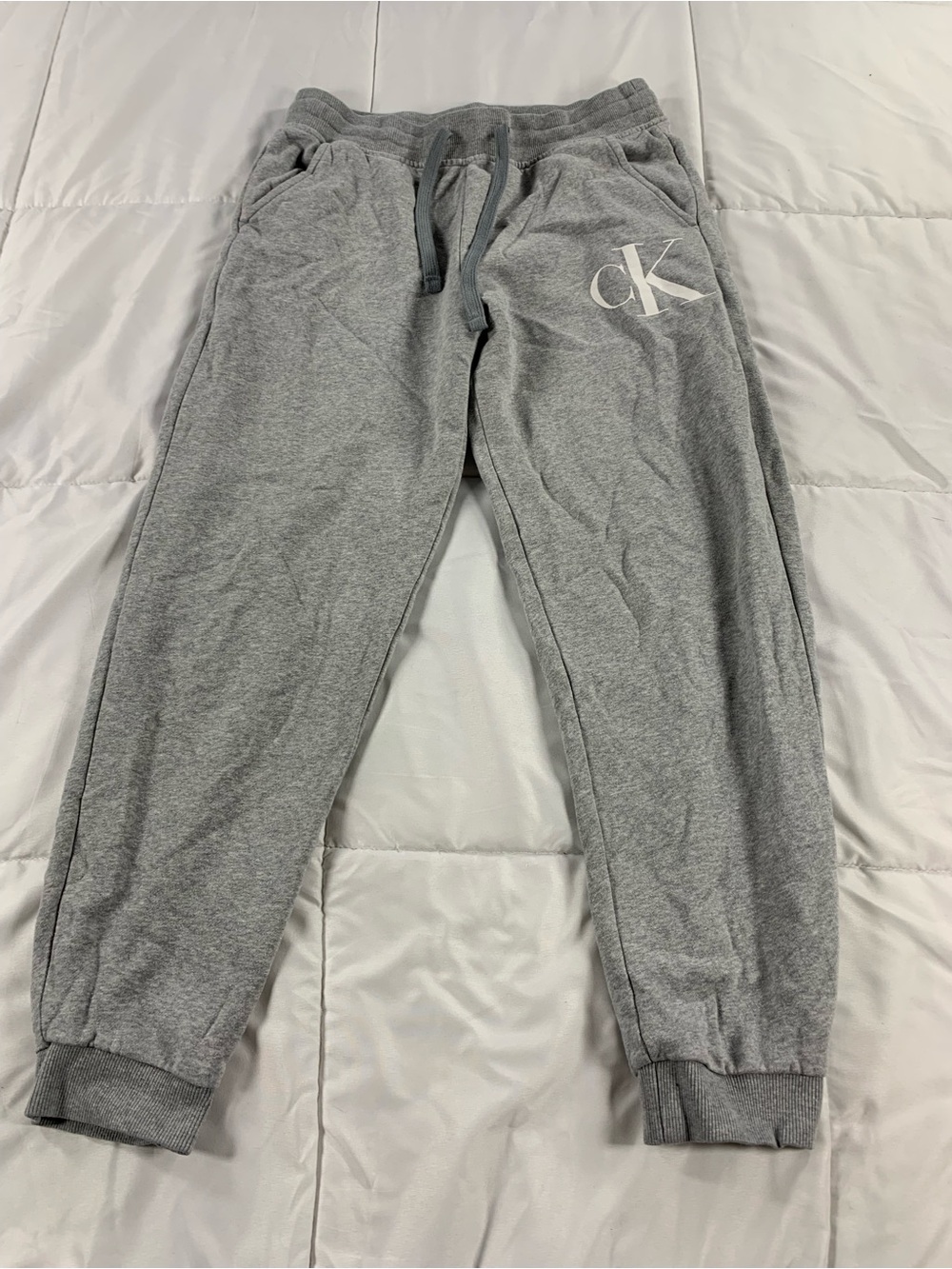 Pre loved CALVIN KLEIN track pants mens size M